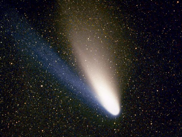 Der Komet Hale-Bopp, aufgenommen am 11. März 1997. Schön zu sehen sind der blaue
                                Gasschweif und der weiße Staubschweif. © USNO